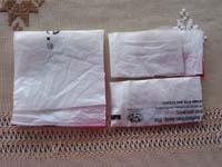 widths of plastic bags ready to link together into plarn